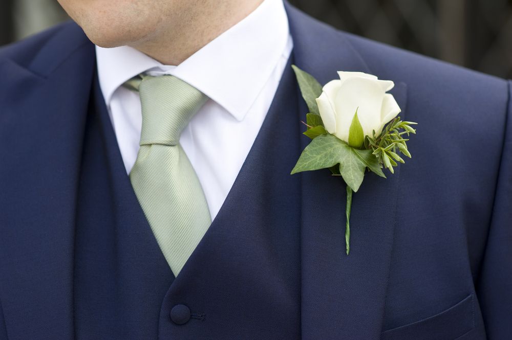 Boutonnière On A Three Piece Blue Suit