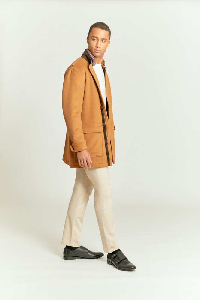 Tailored cream chinos partnered with a stylish light brown coat, styled and custom made by Senszio